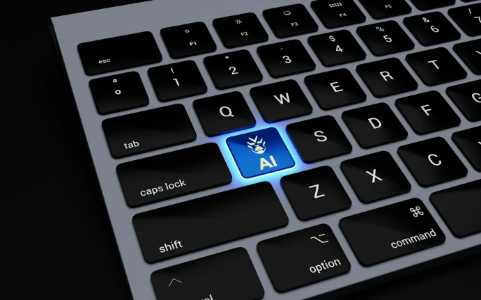 a close up of a keyboard with a blue light on it